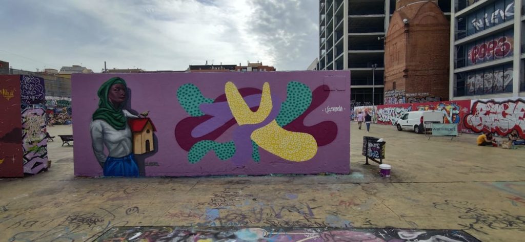 Detalle de una obra de la actividad – JAM MIGRACIÓN WALLSPOT, Barcelona, arte urbano social, Rebobinart 2022