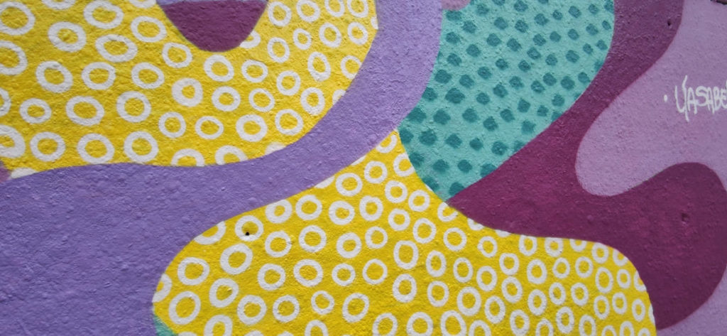 Proceso de pintura durante la actividad – JAM MIGRACIÓN WALLSPOT, Barcelona, mural corporativo, Rebobinart 2022